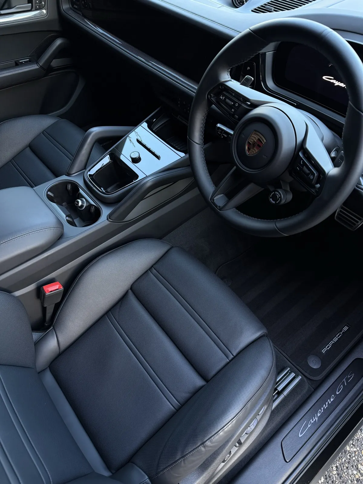 Porsche Cayenne GTS interior with Cayenne GTS sill badge after a signature detail